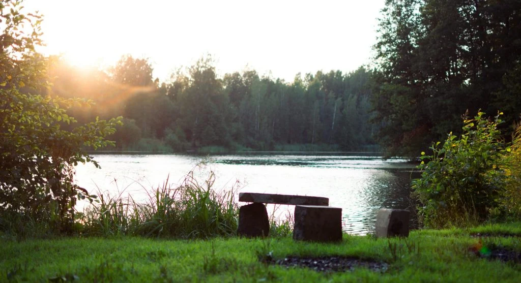 Calm lakeside scene in Canada with comfortable outdoor seating