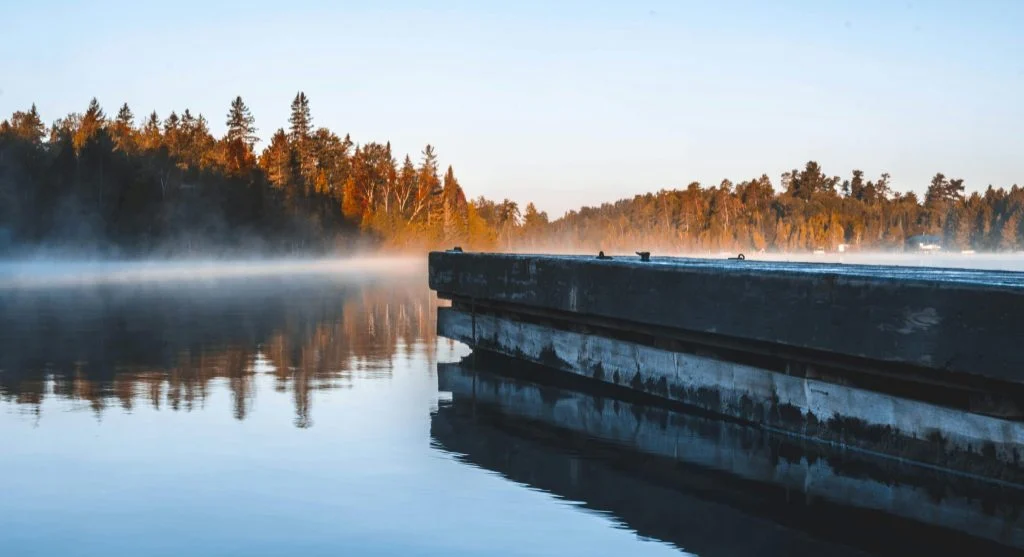 Scenic sunrise in Canada with soft morning light and calm natural views