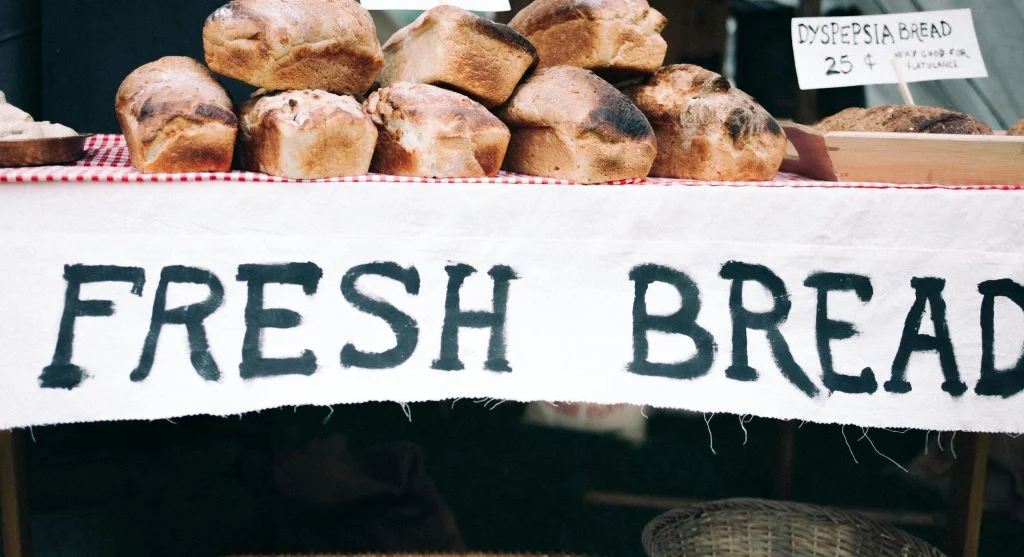 Local bakeries in Canada during morning hours with people buying fresh bread and pastries