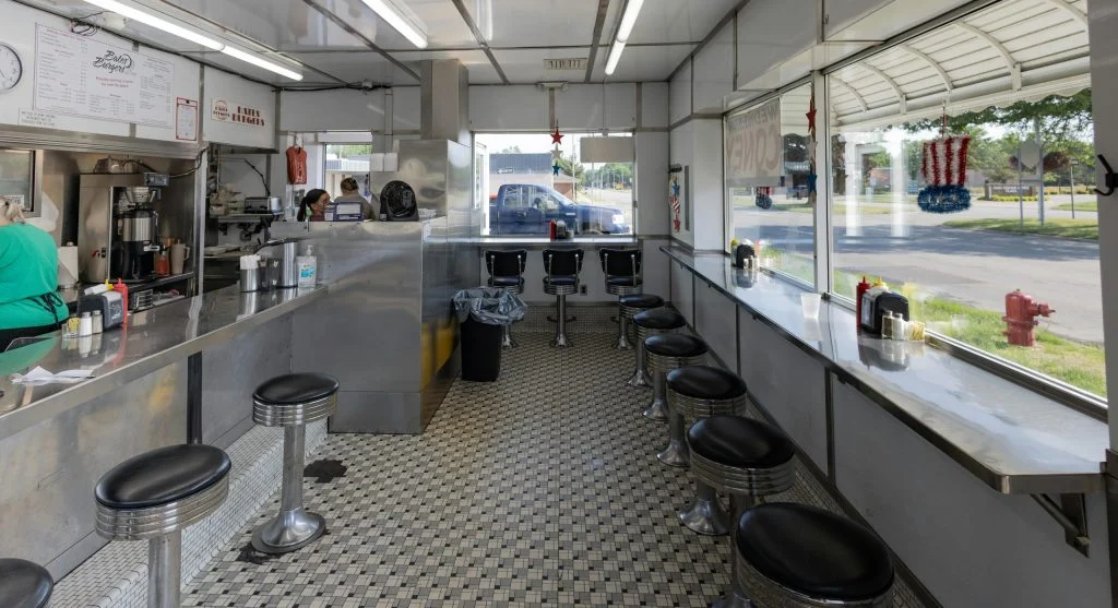 A bustling diner in Canada filled with people enjoying breakfast