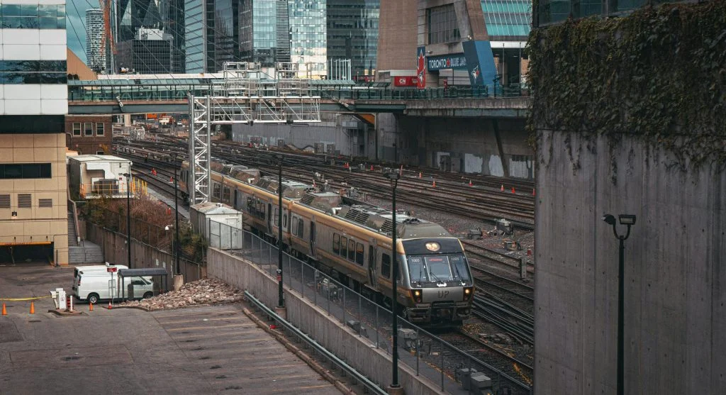 Scenic train arriving at a regional station in Canada