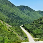 Winding regional road through Canadian towns and villages