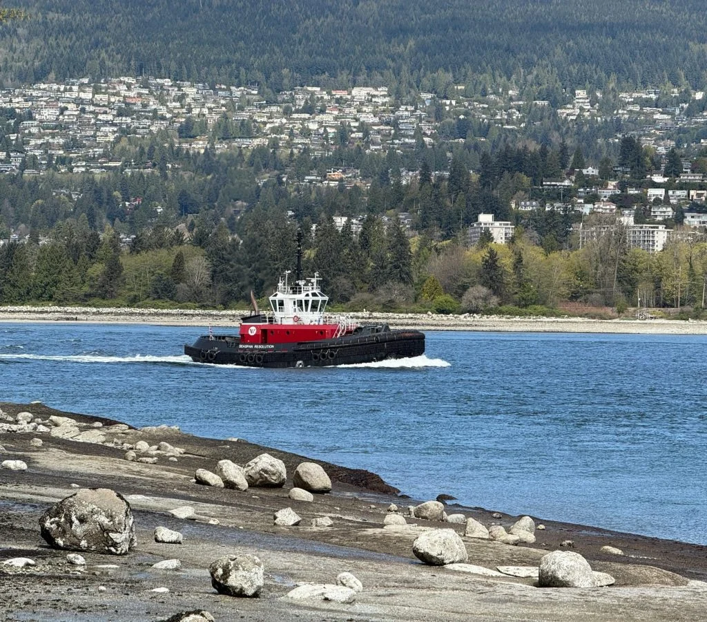 Scenic view of Canada's shoreline with rocky cliffs and serene water