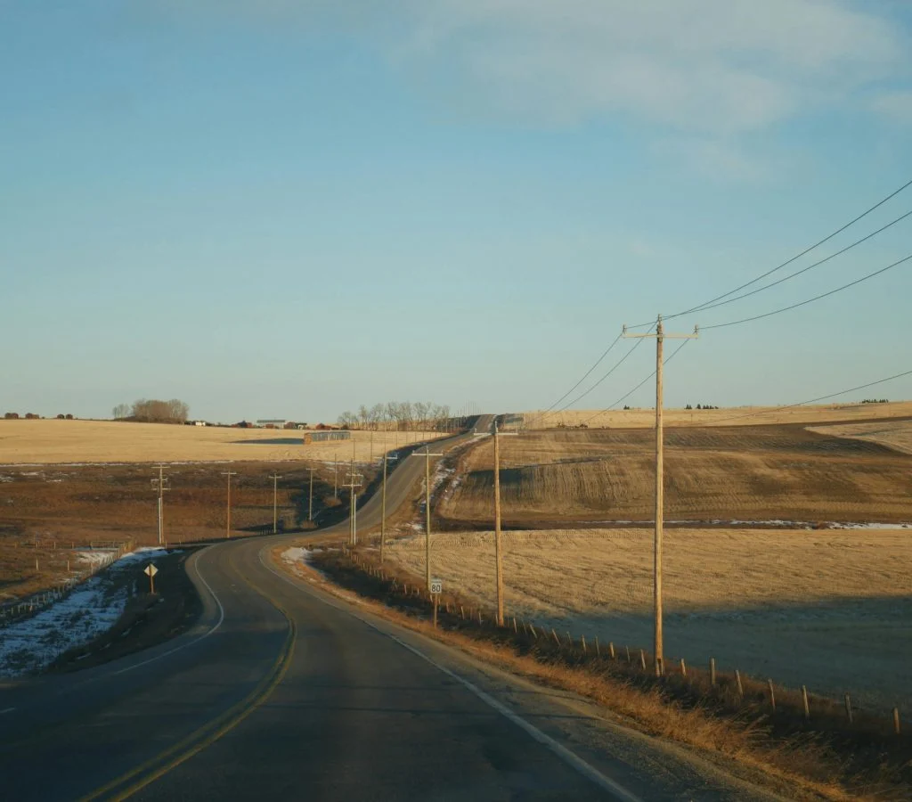Winding roads with scenic lookout points and vast open landscapes in Canada