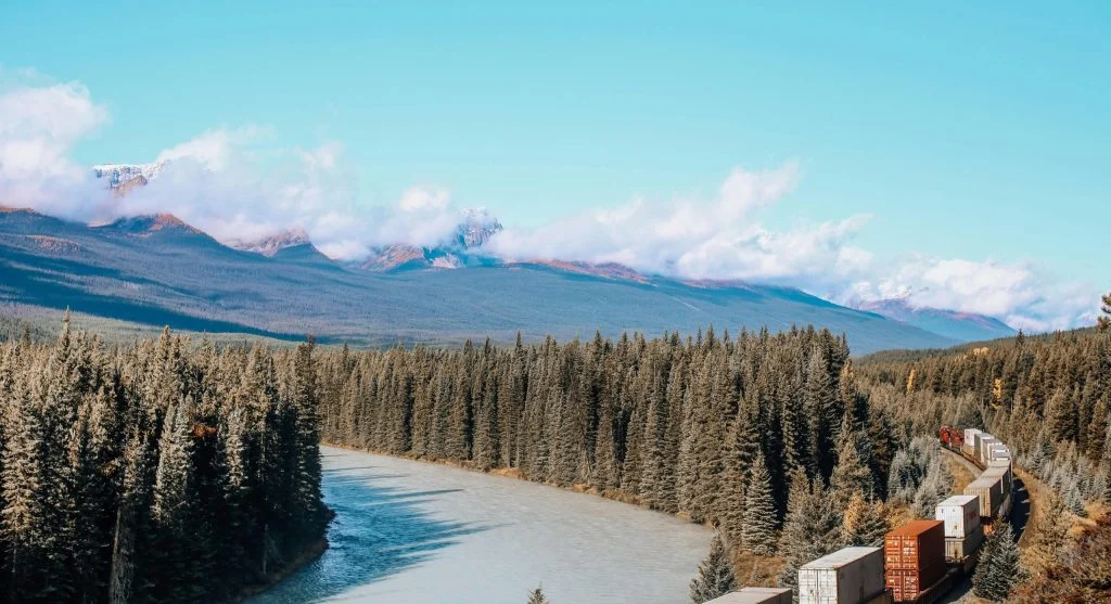 Scenic train travel in Canada with regional views from the window