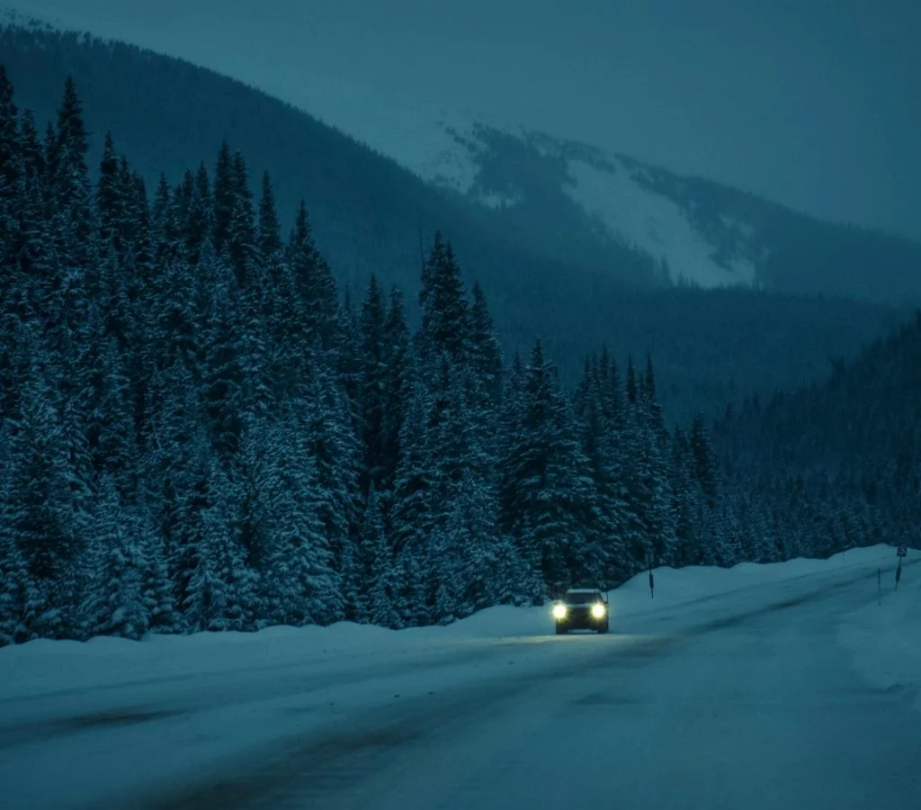 Aurora borealis over Canadian landscape during winter