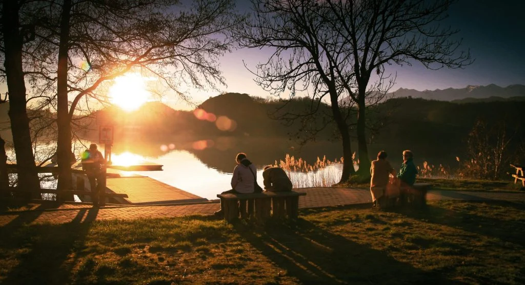 People enjoying outdoor activities on a warm summer evening in Canada